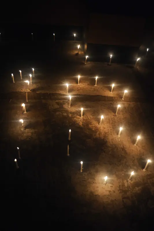 A good night celebration by lighting candles on the roof of the building